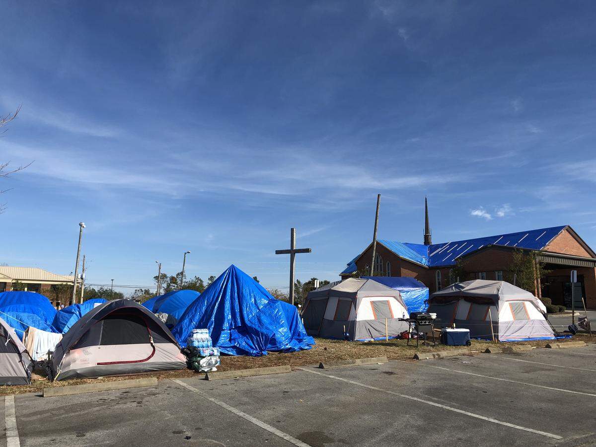 Tents sprung up outside the Forest Park Methodist Church in Panama City after Hurricane Michael destroyed about 60 percent of the city’s homes. Mayor Greg Brudnicki said the camp mostly includes out-of-town workers and volunteers who could not find hotel rooms. But some campers say they pitched their tents after their homes were destroyed.