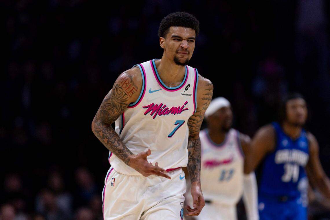 Miami Heat center Kel’el Ware (7) reacts to hitting a three-pointer during the second half of an NBA game against the Orlando Magic at Kaseya Center on January 27, 2025, in Miami.