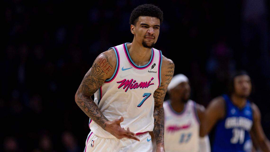 Miami Heat center Kel’el Ware (7) reacts to hitting a three-pointer during the second half of an NBA game against the Orlando Magic at Kaseya Center on January 27, 2025, in Miami.