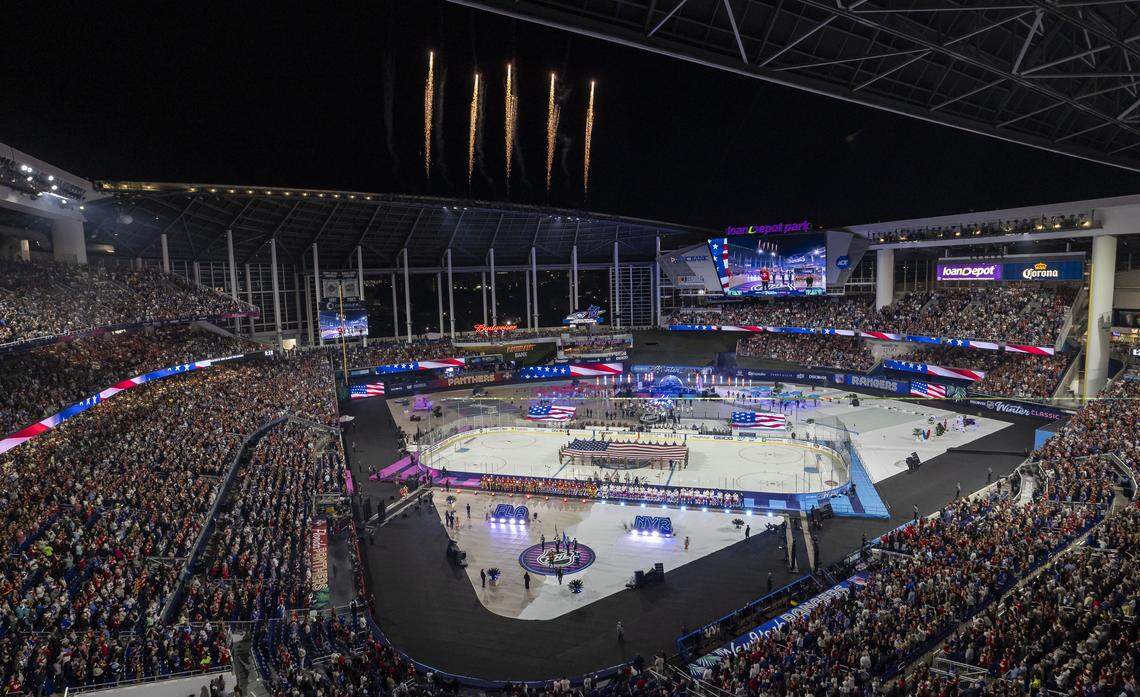 The Florida Panthers and the New York Rangers line up during the opening ceremony of their Winter Classic outdoor hockey game at loanDepot park on Friday, Jan. 2, 2026, in Miami, Fla.