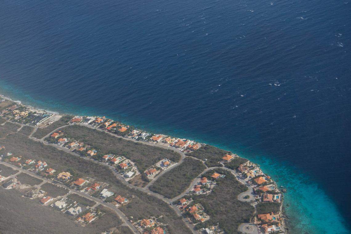 Curaçao, shown here from the air, lies just off the coast of Venezuela. The Dutch island’s economy relies on a refinery that processes Venezuelan oil and visits from Venezuelan tourists. But the economic and political crisis in Venezuela has hit Curaçao hard.