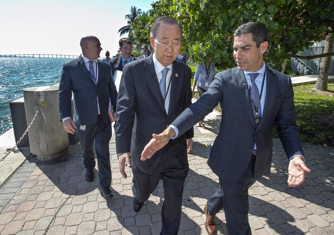 Miami Mayor Francis X. Suarez, at right, gives former Secretary-General of the United Nations, Ban Ki-moon, a tour of Miami’s sea rise adaptation measures on Tuesday.