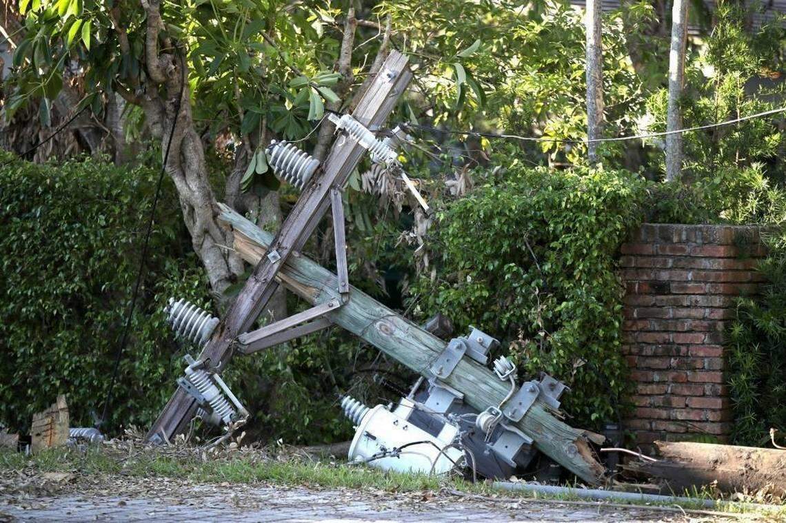 A downed utility pole lies on the ground in Coral Gables on Sept. 16, 2017, following Hurricane Irma.