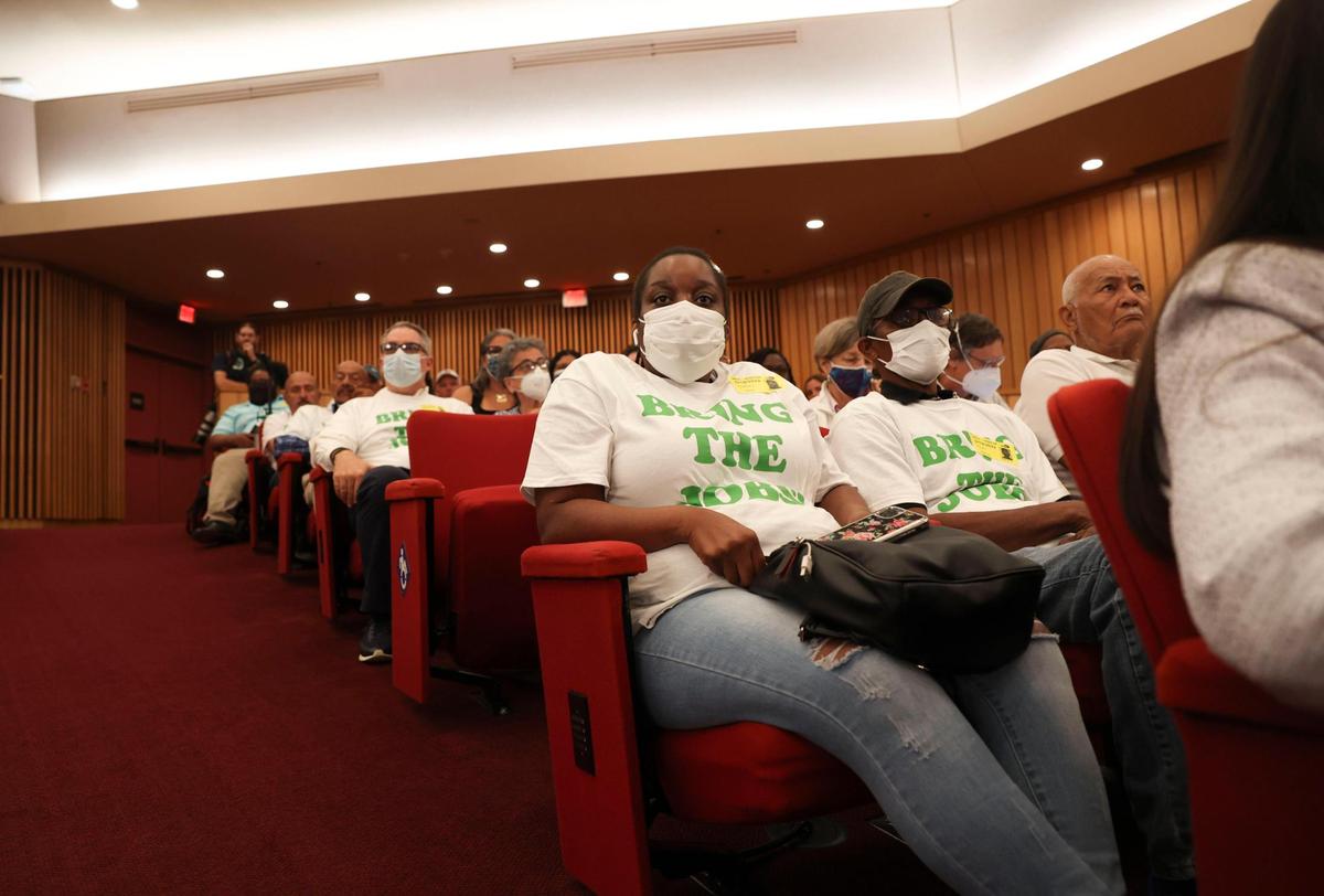 Ashika Campbell, from Naranja, wears a “Bring the Jobs” shirt during a meeting discussing a vote on expanding the Urban Development Boundary before the Miami-Dade County Commission on Thursday, May 19, 2022, at the Stephen P Clark Center in Miami. Campbell was for expansion of the Urban Development Boundary.