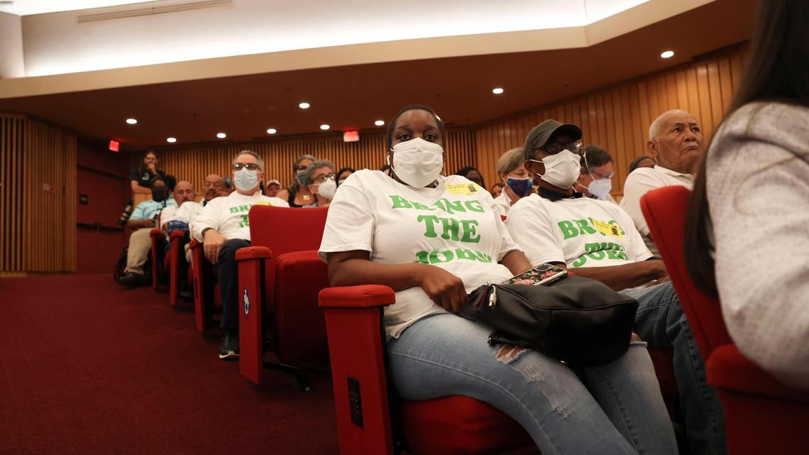 Ashika Campbell, from Naranja, wears a “Bring the Jobs” shirt during a meeting discussing a vote on expanding the Urban Development Boundary before the Miami-Dade County Commission on Thursday, May 19, 2022, at the Stephen P Clark Center in Miami. Campbell was for expansion of the Urban Development Boundary.