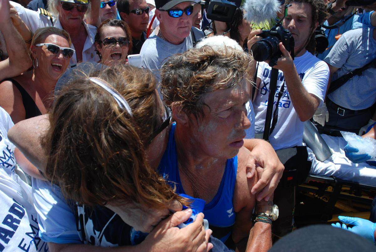 Diana Nyad told the crowd to "never give up" after she finished her historic 110-mile swim from Havana to Key West.