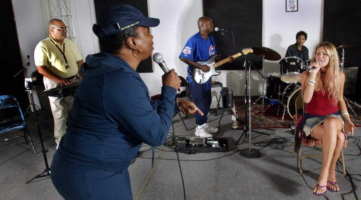 British singer Joss Stone, right, then 16, records in 2003 with 1970s Miami musicians Timmy Thomas on the organ, singer Betty Wright, guitarist A.J. Niilo and drummer Cindy Blackman.