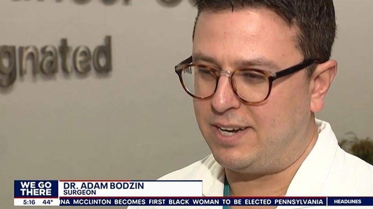 Adam Bodzin, a transplant surgeon, bolted through traffic to a transport vehicle to secure a liver for his patient waiting for surgery.