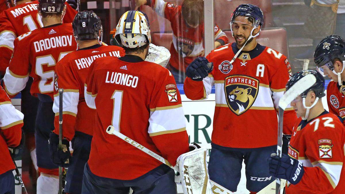 Florida Panthers goalie Roberto Luongo (1) and center Vincent Trocheck (21) celebrate their 3-1 win over the Toronto Maple Leafs on Jan. 18, 2018, in Sunrise. “We have our confidence back, that swagger,” Luongo said.