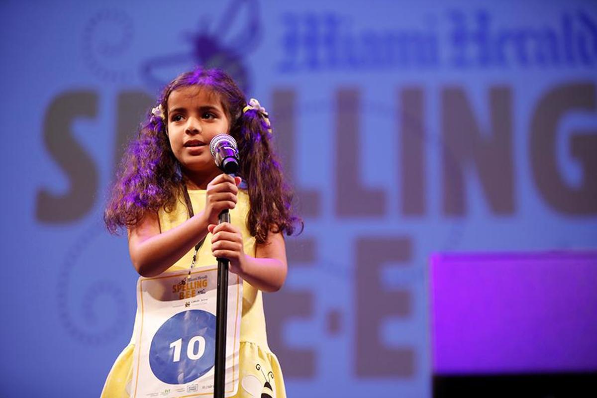 Judie ElAttar, 7, a first-grader at David Fairchild Elementary, was the youngest speller at the Miami Herald Spelling Bee held Thursday, March 17, 2022, at the Charles F. Dodge City Center in Pembroke Pines. Her microphone had to be lowered each time she spoke.