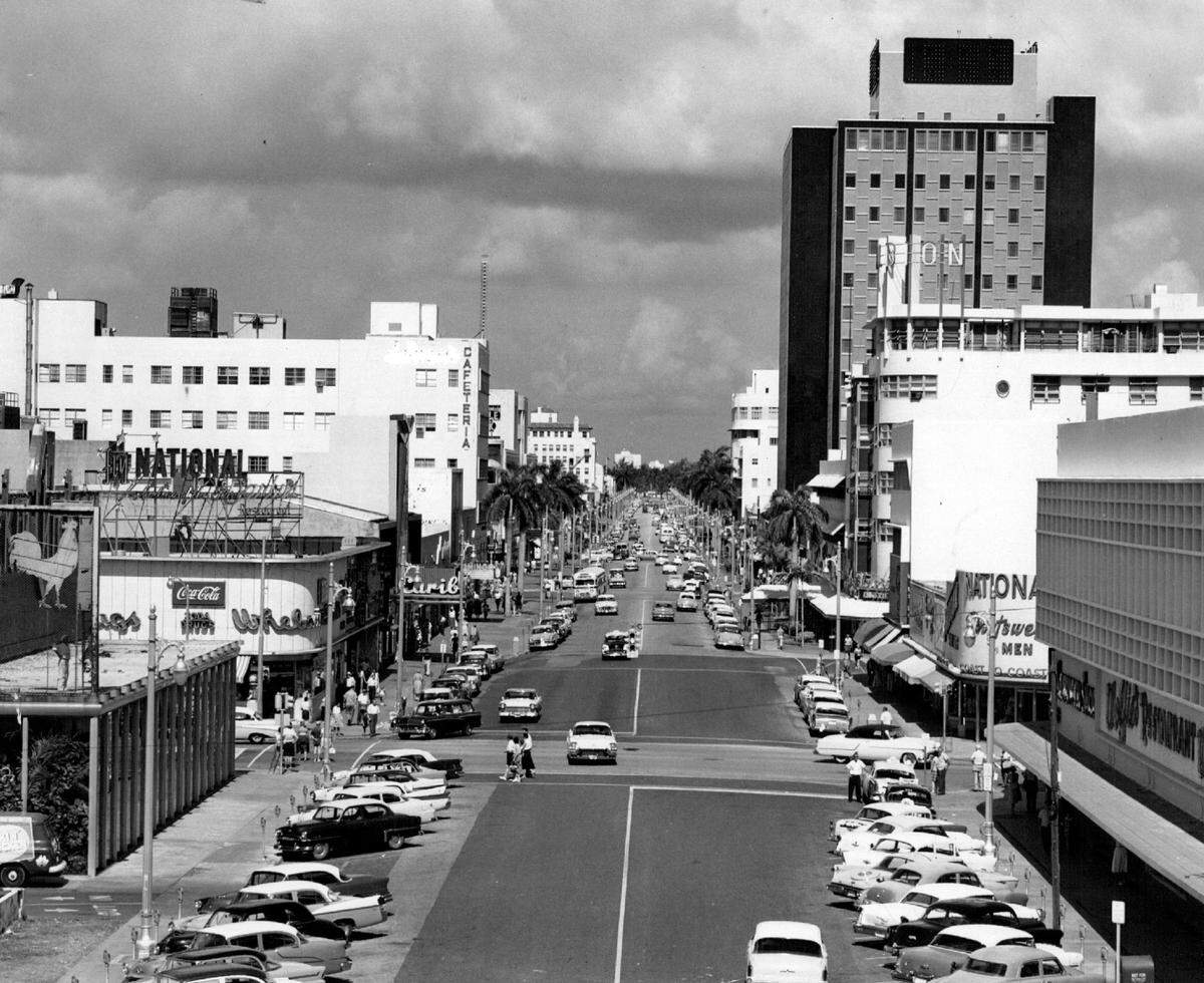 A view of Lincoln Road and the iconic bank building with rooftop clock.