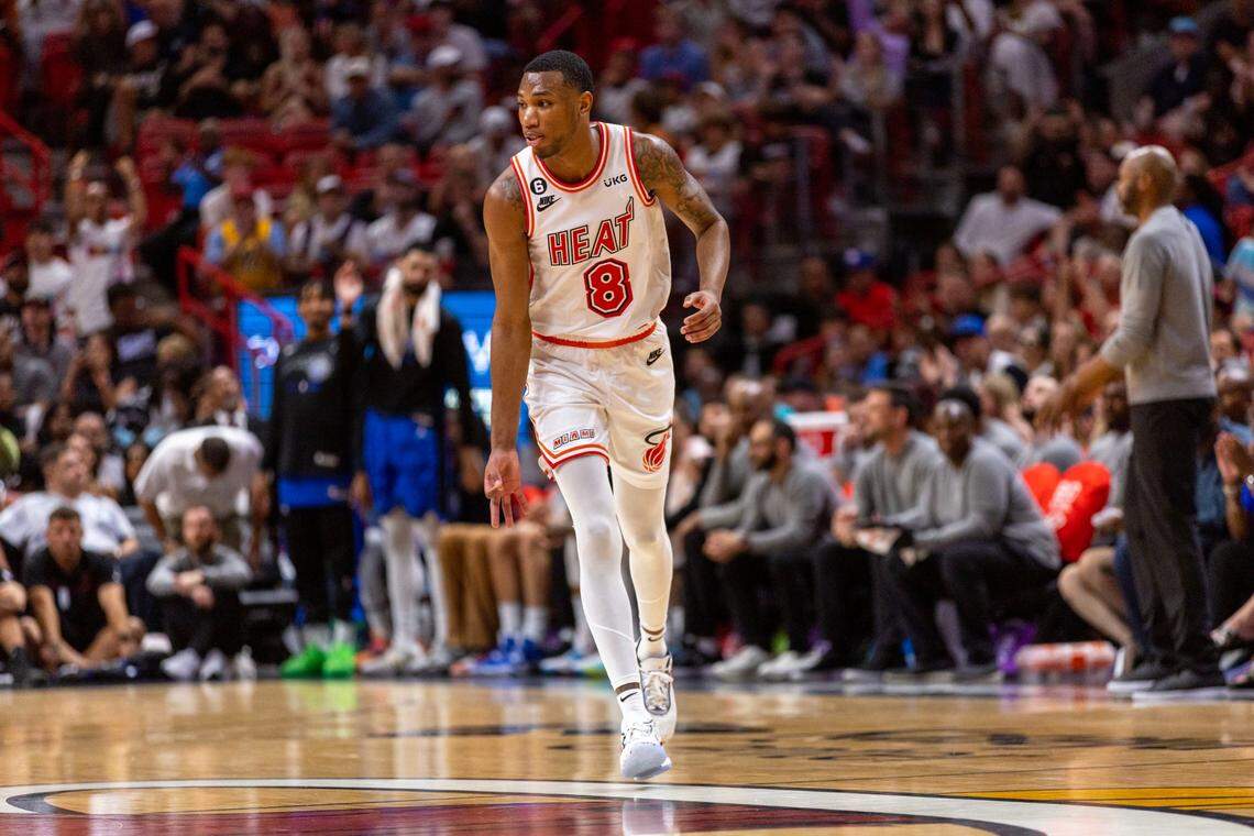 Miami Heat forward Jamal Cain (8) reacts to hitting a three-pointer during the second half of an NBA game against the Orlando Magic at Kaseya Center in Downtown Miami, Florida, on Sunday, April 9, 2023.