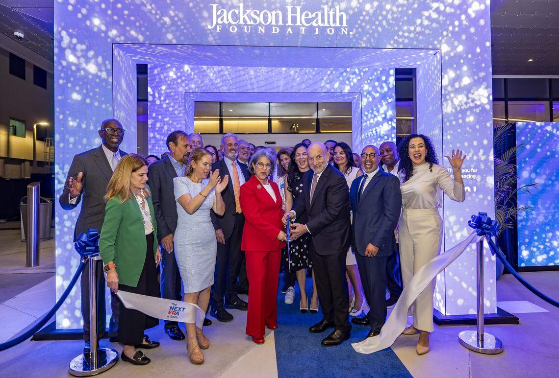 Miami Dade County Mayor Daniella Levine Cava and Carlos Migoya, outgoing Jackson Health System chief executive officer, cut a ribbon during a preview event of a new emergency room at Jackson Memorial Hospital on Thursday, April 16, 2026, in Miami, Fla.