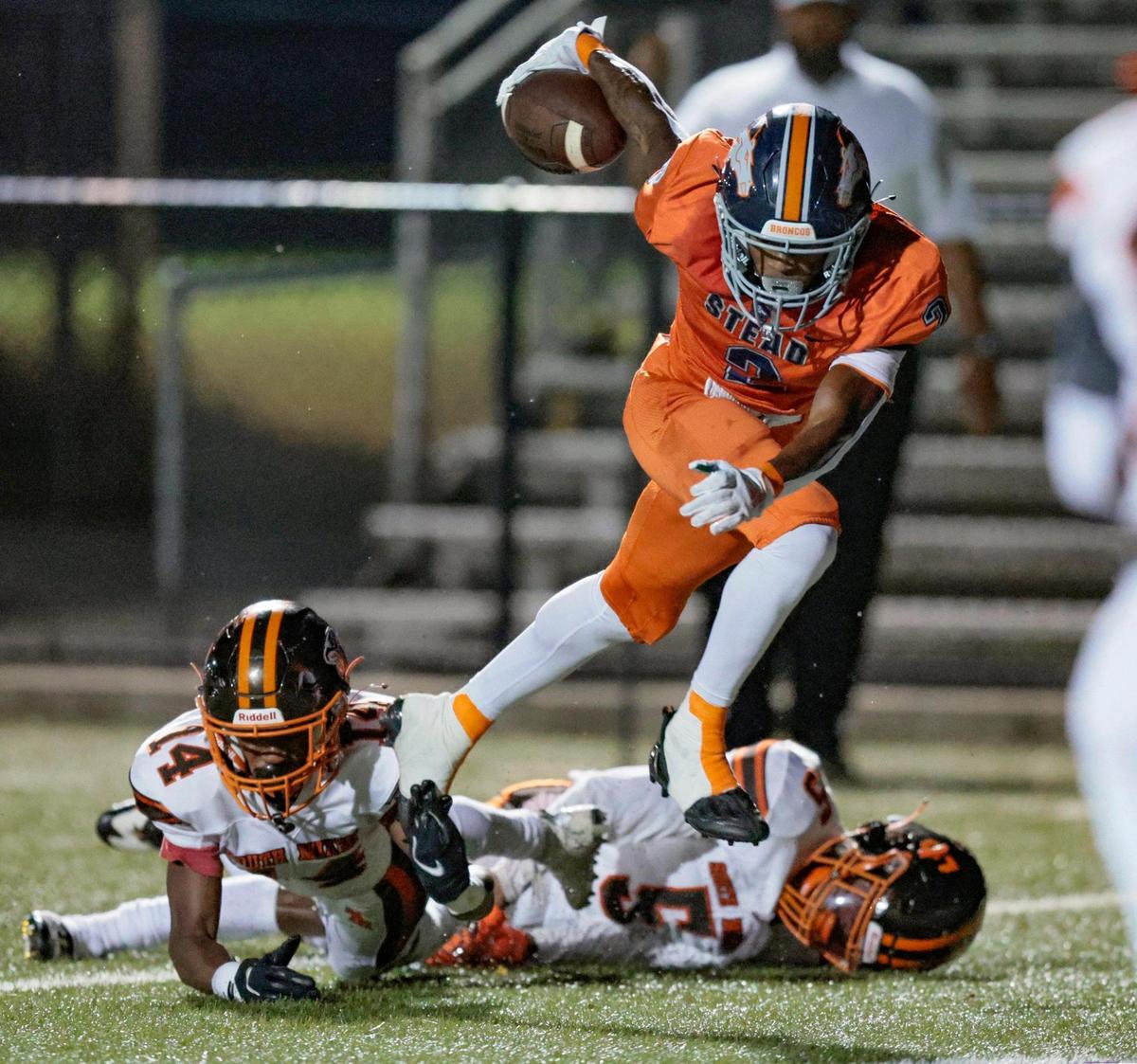 Homestead Broncos wide receiver Richard Dandridge (2) scores on a pass reception in the first half against the South Miami Cobras at Harris Field in Homestead, Florida on Friday, September 30, 2022.