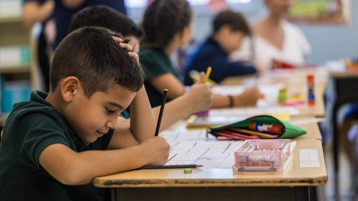 Third grade students work on their projects at the Dr. Rolando Espinosa K-8 Center, during the first day of school for Miami-Dade County Public Schools (M-DCPS) in the 2025-2026 school year, on Thursday, August 14, 2025.

