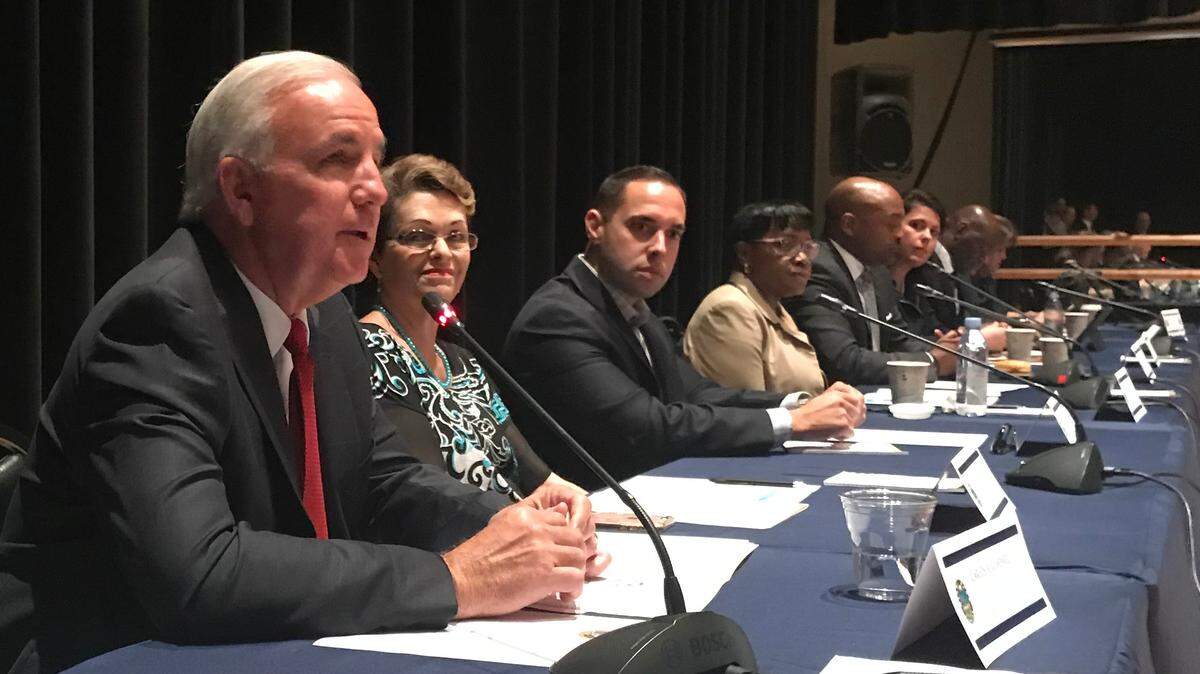 Miami-Dade Mayor Carlos Gimenez addresses a joint meeting of county commissioners and state lawmakers from Miami-Dade. To his right are Rebeca Sosa, a county commissioner, and Bryan Avila, a state representative trying to shut down a county toll board that Gimenez leads as chairman. To the right of Avila are Audrey Edmonson, chairwoman of the County Commission, and Oscar Braynon II, chairman of the Miami-Dade delegation.