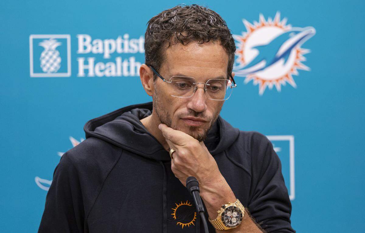 Miami Dolphins head coach Mike McDaniel reacts while talking with reporters before the start of a team practice session at the Baptist Health Training Complex on Wednesday, Sept. 10, 2025, in Miami Gardens, Fla.