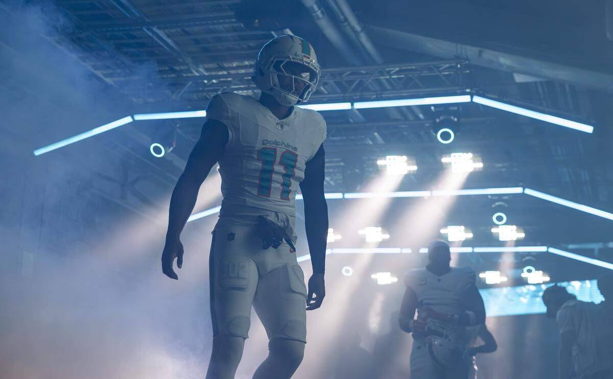 Miami Dolphins safety Dante Trader Jr. (11) makes his way on the field before playing against the Buffalo Bills in their NFL game at Hard Rock Stadium on Sunday, Nov. 9, 2025, in Miami Gardens, Fla.