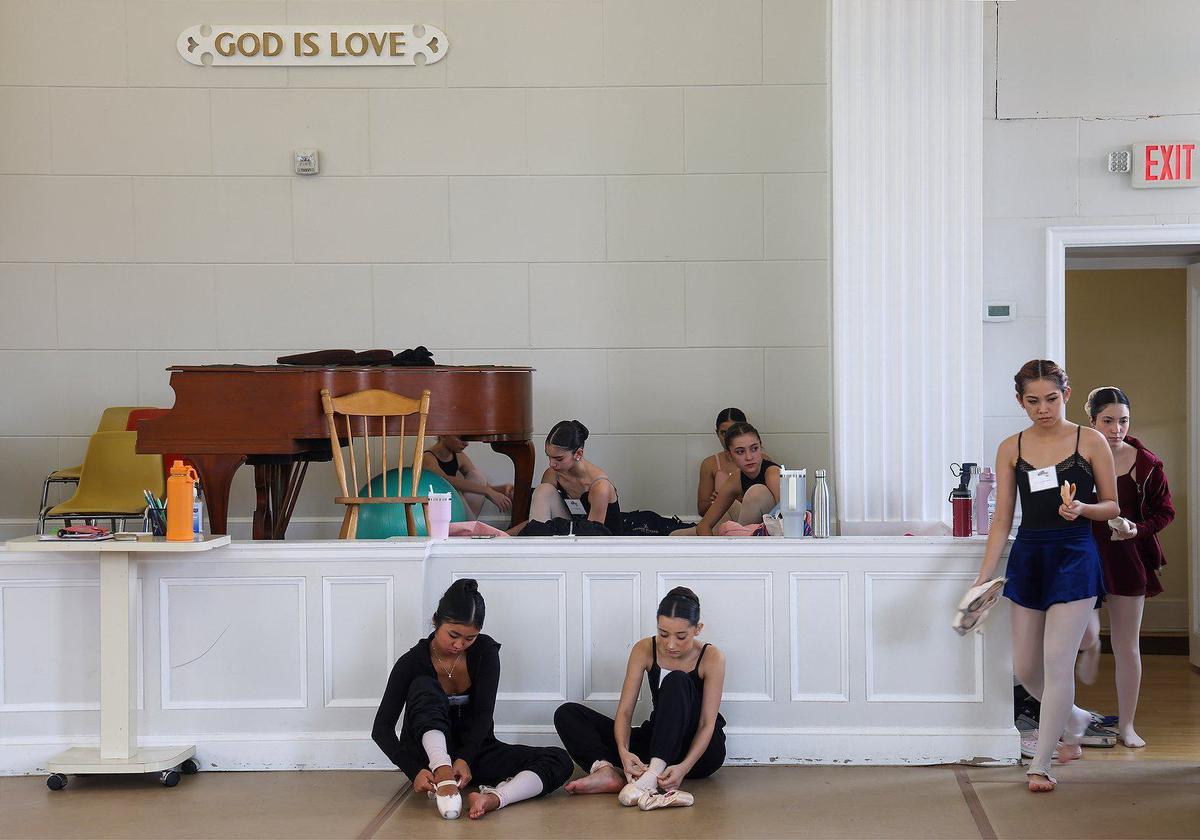 Young dancers gather as they prepare for rehearsal inside one of the spaces owned by nonprofit, Sanctuary of the Arts. The dance studio used to be the First Church of Christ Scientist, but was rented and converted by the nonprofit.