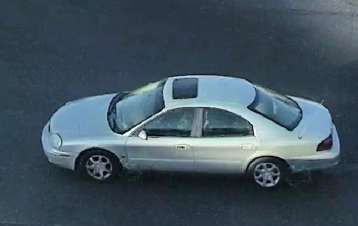 A man fled in a light-colored car after fatally shooting a mom in a Dunkin’ drive-thru, cops say.