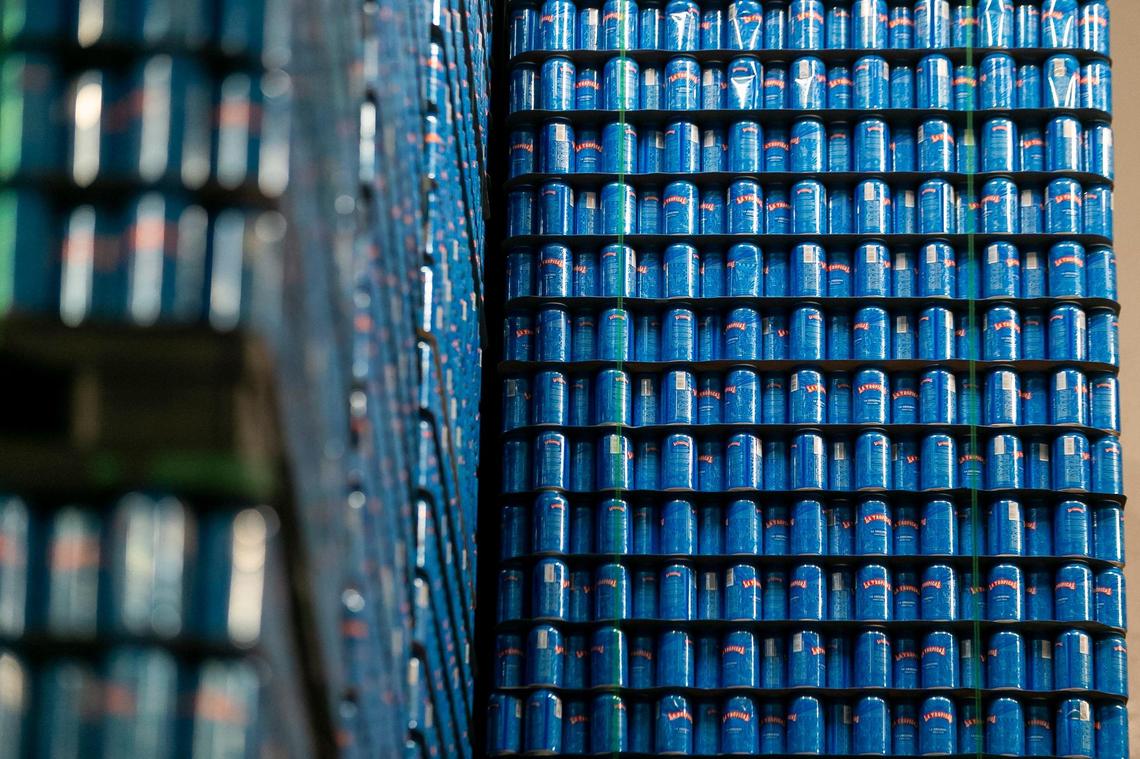 Cans of La Tropical’s La Original Amber Lager are stacked at Cerveceria La Tropical’s brew house in Wynwood on Wednesday, February 17, 2021.