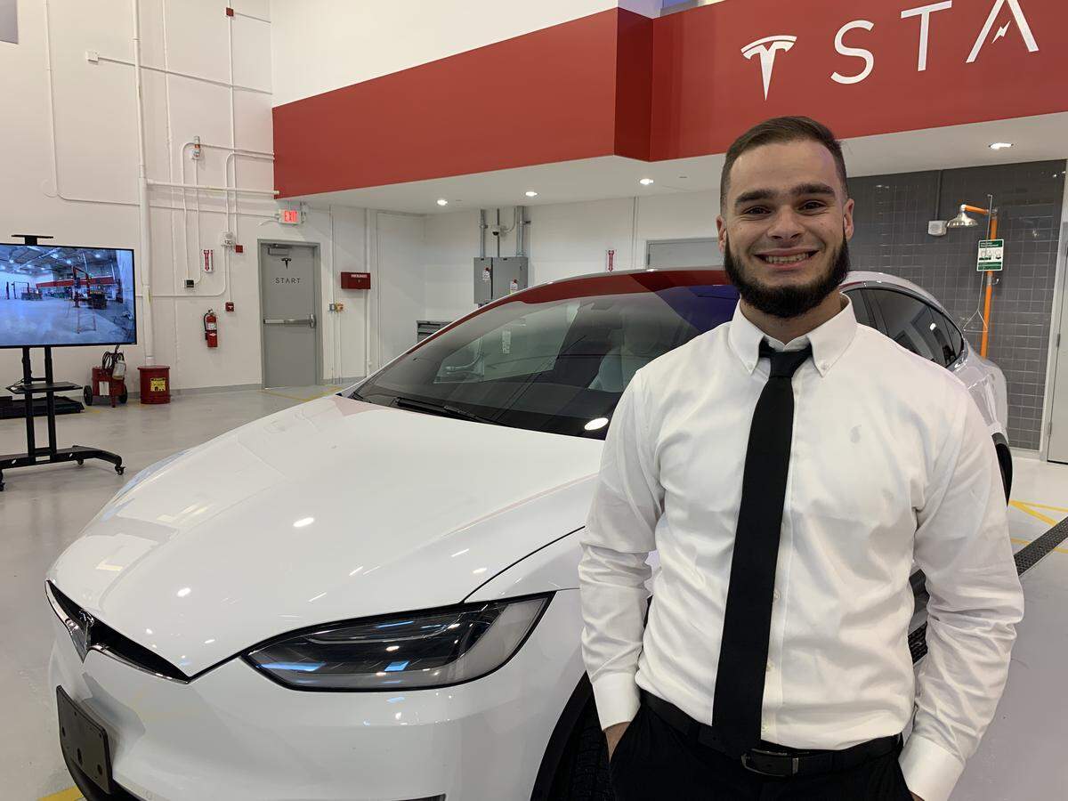 William Ramirez, 22, is one of the first nine students at Miami Dade College to graduate from the Tesla START program.