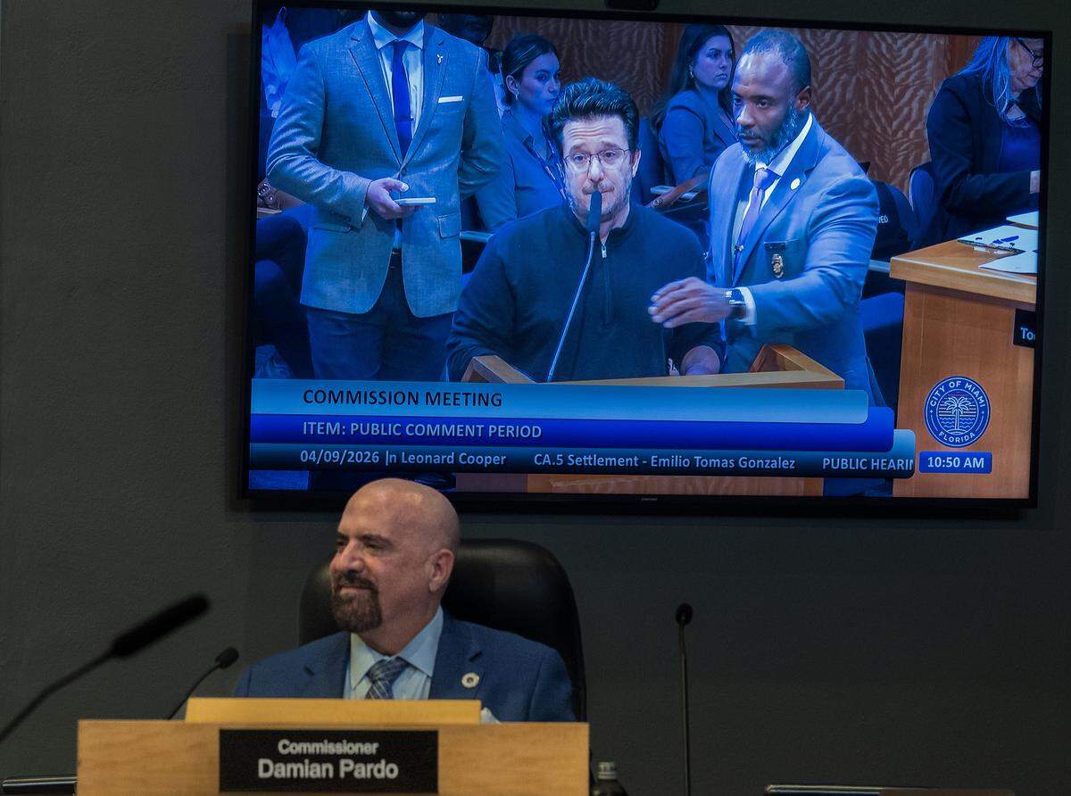 City of Miami Commissioner Damian pardon listens as resident Billy Corben directs comments at him during a City of Miami Commission meeting, at City Hall, on Thursday April 09, 2026.