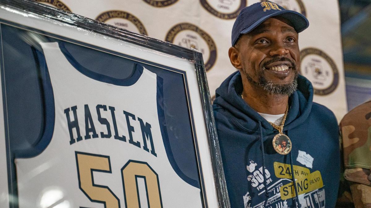 NBA Miami Heat forward Udonis Haslem (40) poses for photos during his High School Jersey Retirement Ceremony at Miami Senior High School in Miami, Florida on Tuesday, December 27, 2022.