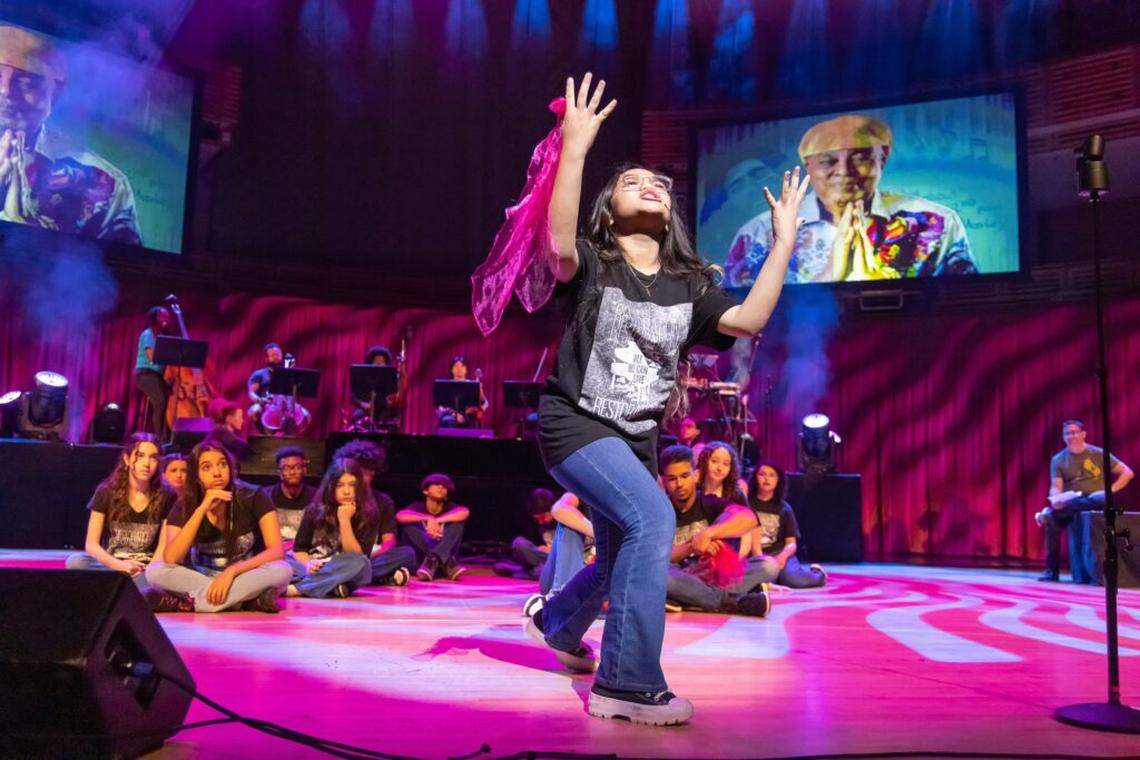 Ysabella Villaflor, a seventh grader from Bowman Ash Doolin K-8 performing her Piano Slam poem about Miami on The Adrienne Arsht Center stage last year.
