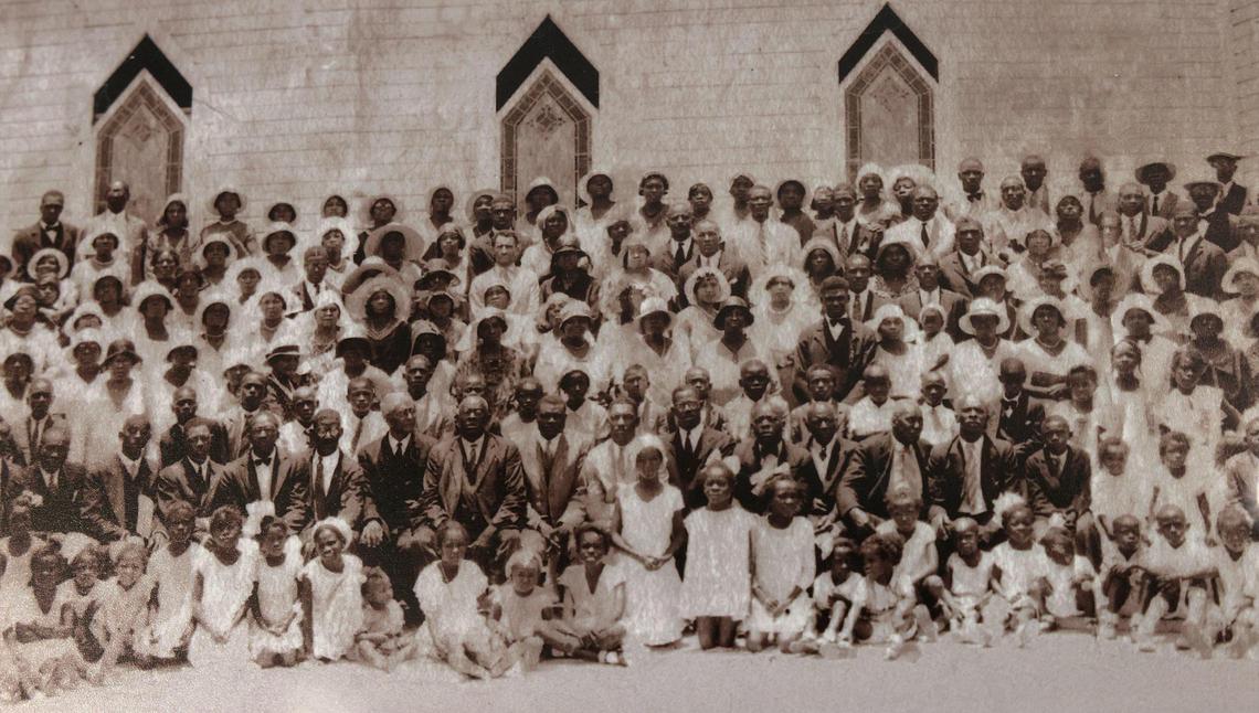 An early photo of St. John Institutional Missionary Baptist Church parishioners is displayed inside the church’s fellowship hall on Sunday, July 23, 2023, in Miami’s historic Overtown neighborhood. The church, which is undergoing renovations, is listed on the National Register of Historic Places.