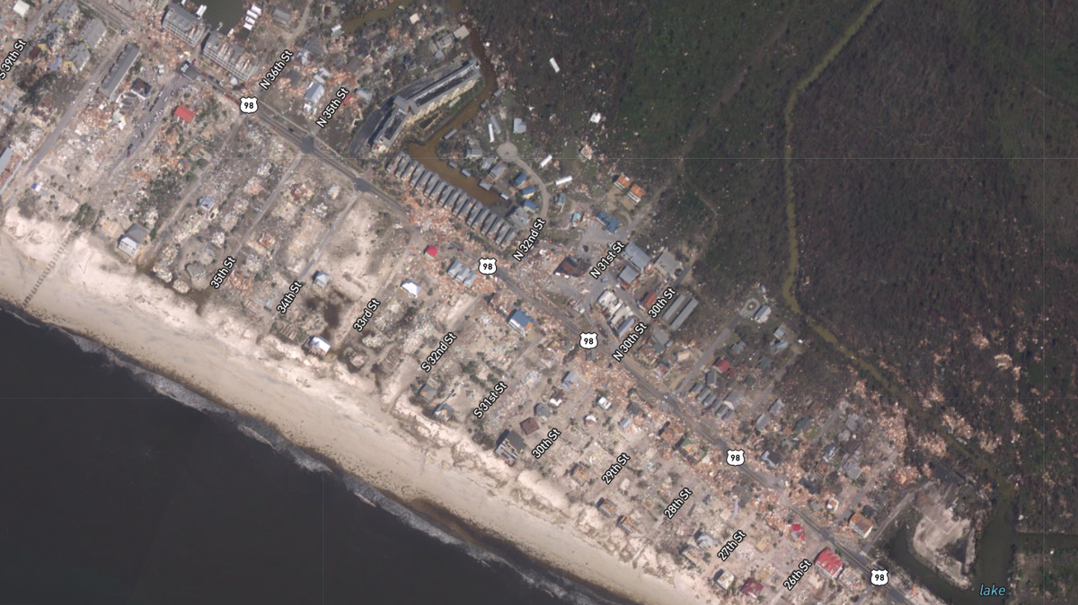 A satellite image taken Thursday by the National Oceanic and Atmospheric Administration after Hurricane Michael made landfall near Mexico Beach, the first Cat 4 storm on record to hit the Panhandle, shows block after block of rubble and flattened homes. Source: NOAA