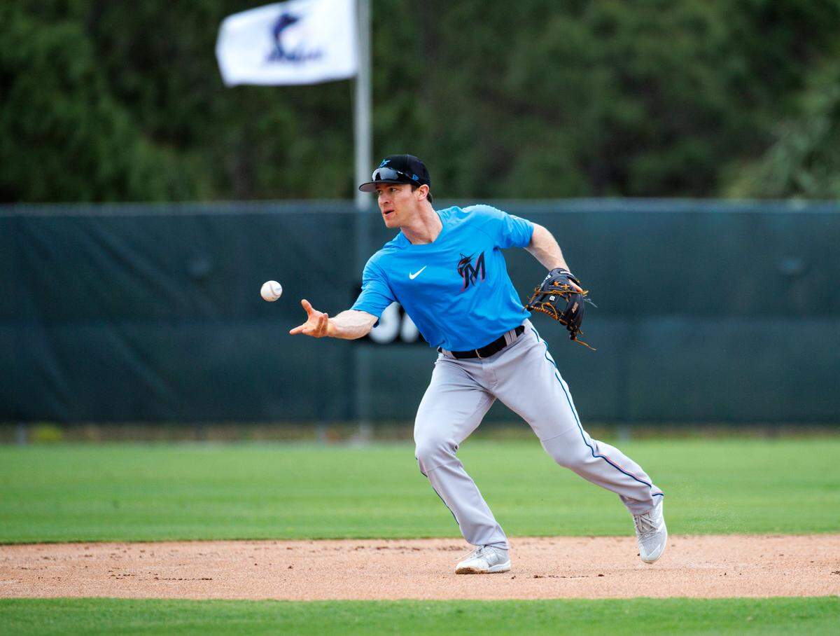 Miami Marlins second baseman Joey Wendle runs drills during their spring training workout at Roger Dean Stadium on Tuesday, March 15, 2022, in Jupiter.