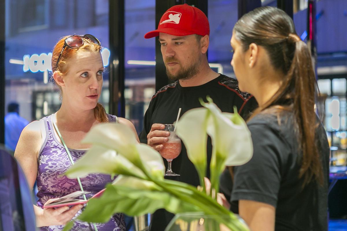 Jennifer Kadin, 37, and Matt Munowitch, 32, talk to Nalini Jagram, 18, a spa therapist at the blow dry bar while vacationing on Royal Caribbean’s Navigator of the Seas in PortMiami on Friday, March 1, 2019. Royal Caribbean spent $115 to upgrade the ship this year.