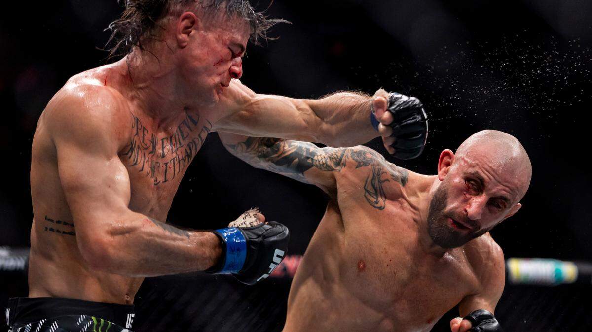 Alexander Volkanovski of Australia fights against Diego Lopes of Brazil in their featherweight title bout during UFC 314 at the Kaseya Center on Saturday, April 12, 2025, in downtown Miami, Fla.