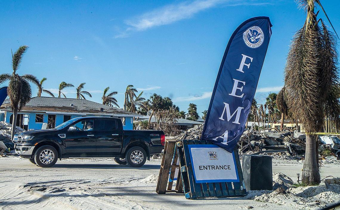 A FEMA sign is displayed on Estero Boulevard in Fort Myers Beach Wednesday, Oct. 26, 2022. The sign is there for residents who lost their houses during Hurricane Ian, which made landfall in the area Wednesday, Sept. 28, 2022.