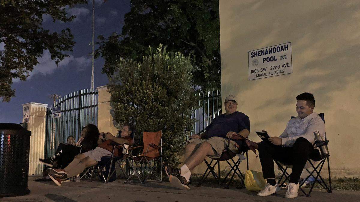Parents lined up in front of Shenandoah Pool at 1:38 a.m. on Monday, Oct. 22, to register their kids for swim lessons. With a limited number of spots in the classes, families start lining up as early as 12:40 a.m. for the 6 a.m. registration each month.