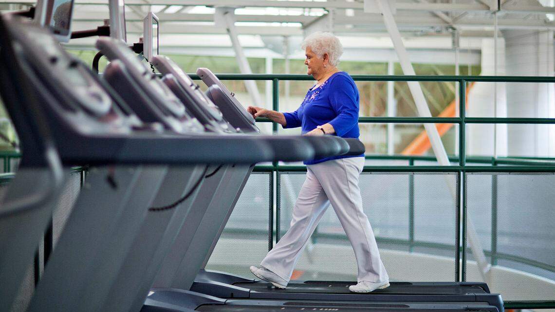 Sarah Luke, 73, of Kennesaw, Ga., walks on a treadmill as part of a new exercise program at her local YMCA, Friday, April 4, 2014, in Kennesaw, Ga. (AP Photo/David Goldman)