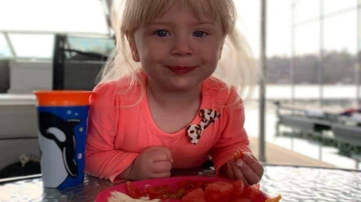Leland Rudeen is seen eating a snack in this undated photograph on her father’s Facebook page. Her family announced Thursday, April 15, 2021, that she died almost a week after being found unconscious in a Florida Keys vacation rental home swimming pool.