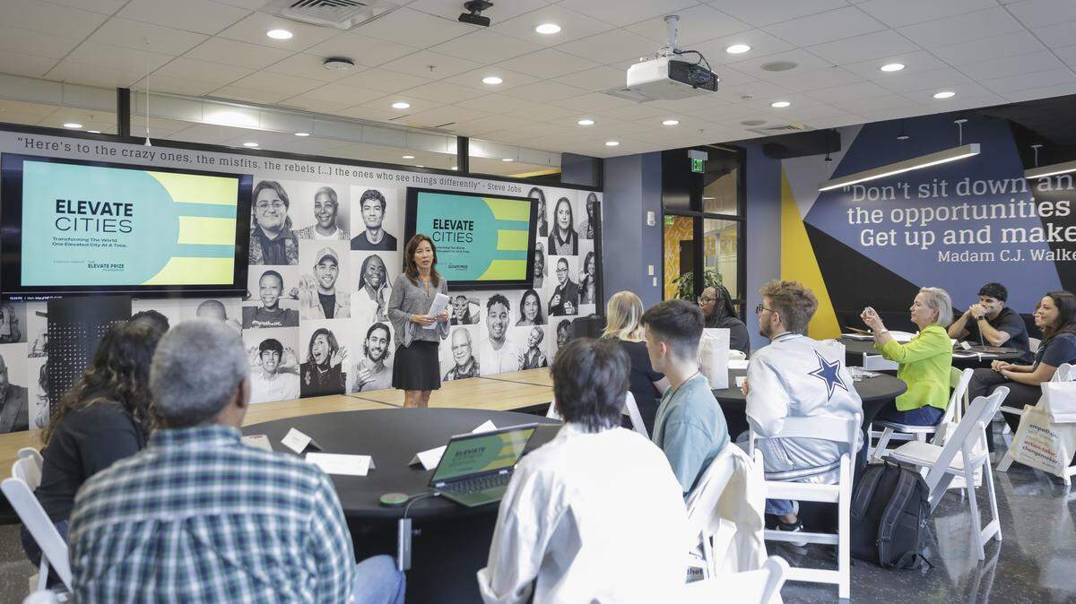 Dr. Sandra Louk LaFleur introduces the Elevate Miami Award selection process to the Elevate Miami Impact Fellows.
