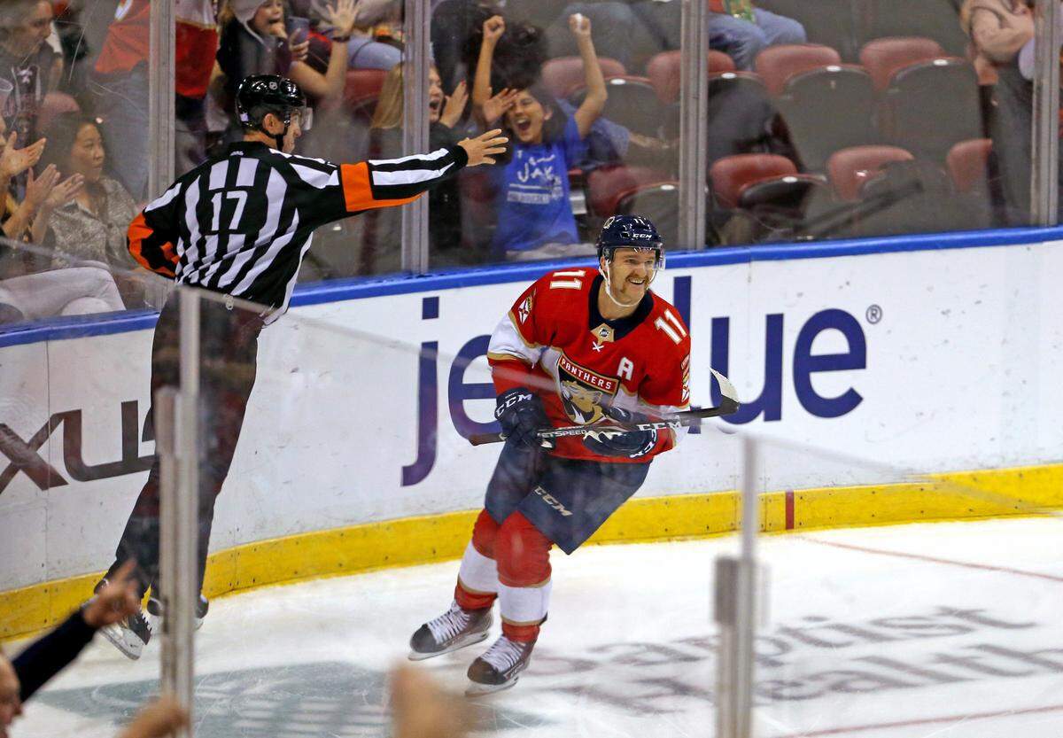 Florida Panthers left wing Jonathan Huberdeau (11) celebrates after scoring his second goal during the third period&nbsp;of an NHL regular season hockey game against the Detroit Red Wings at the BB&T Center on Saturday, November 2, 2019 in Sunrise.
