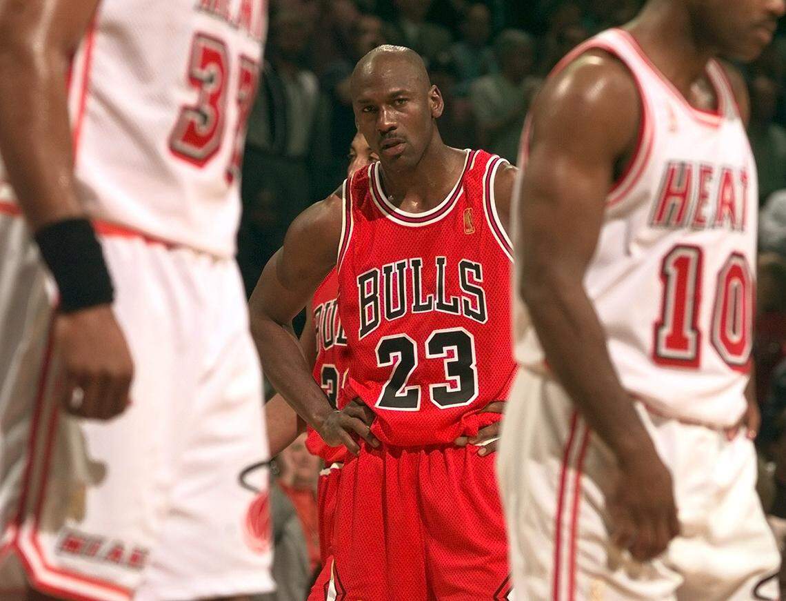 FILE PHOTO - Bulls guard Michael Jordan watches in disbelief during a loss to the Heat late in the fourth quarter at the Miami Arena. This was not the game where the undermanned Heat squad beat the Bulls.