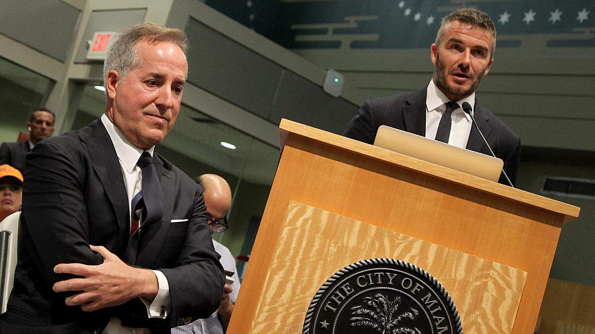 MasTec executive Jorge Mas listens as his franchise partner David Beckham speaks at a public hearing at Miami City Hall on July 12, 2018, on the soccer stadium proposal for Melreese Country Club.