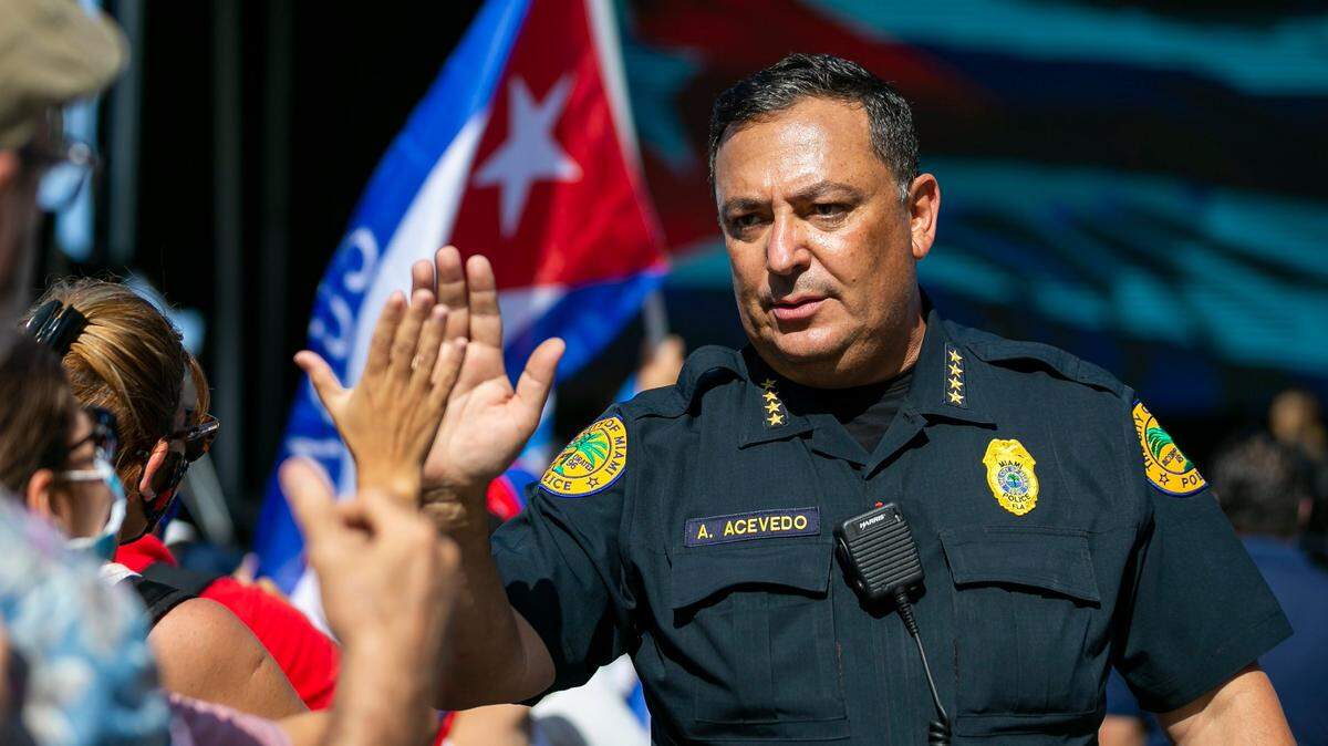 City of Miami Police Chief Art Acevedo greets protesters during a rally at Bayfront Park in downtown Miami on Saturday, July 31, 2021. The rally was held in solidarity with the anti-government protests happening in Cuba.