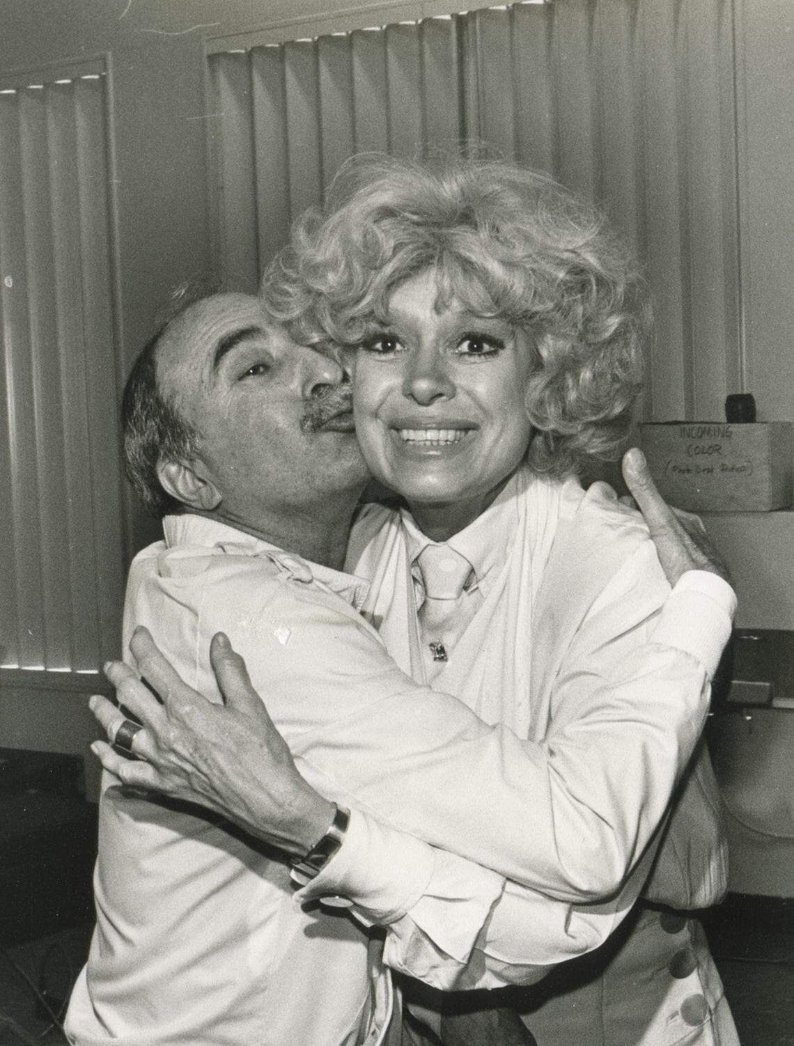 A vintage photo of Charlie Cinnamon and Broadway star Carol Channing, part of the collection featured in the exhibit 'Charlie Cinnamon: Legendary Press Agent.'