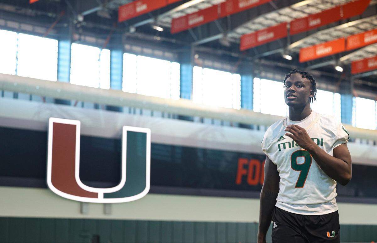 Hurricanes defensive end Nyjalik Kelly (9) walks over to talk to the press after the University of Miami Hurricanes football practice on Tuesday, March 21, 2023, on campus in Coral Gables.
