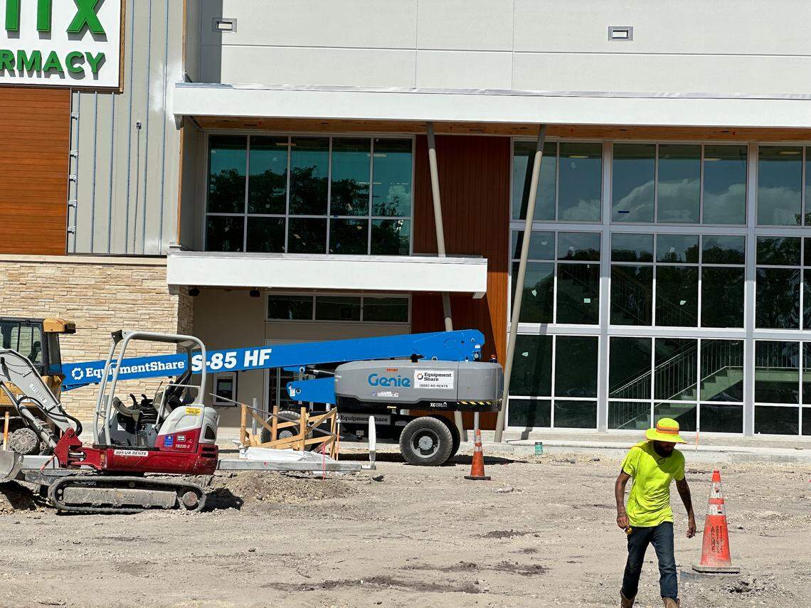 Construction crews work on the storefront of a new build Publix set to replace an old store at the Briar Bay Shopping Plaza across the street from The Falls in South Miami-Dade on Nov. 1, 2024. The mall anchor store, which will be two stories and about 53,000 square feet, is at 13005 SW 89th Place.