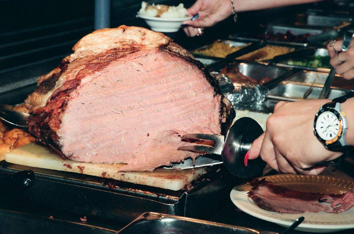 Carving the meat at Piccadilly.