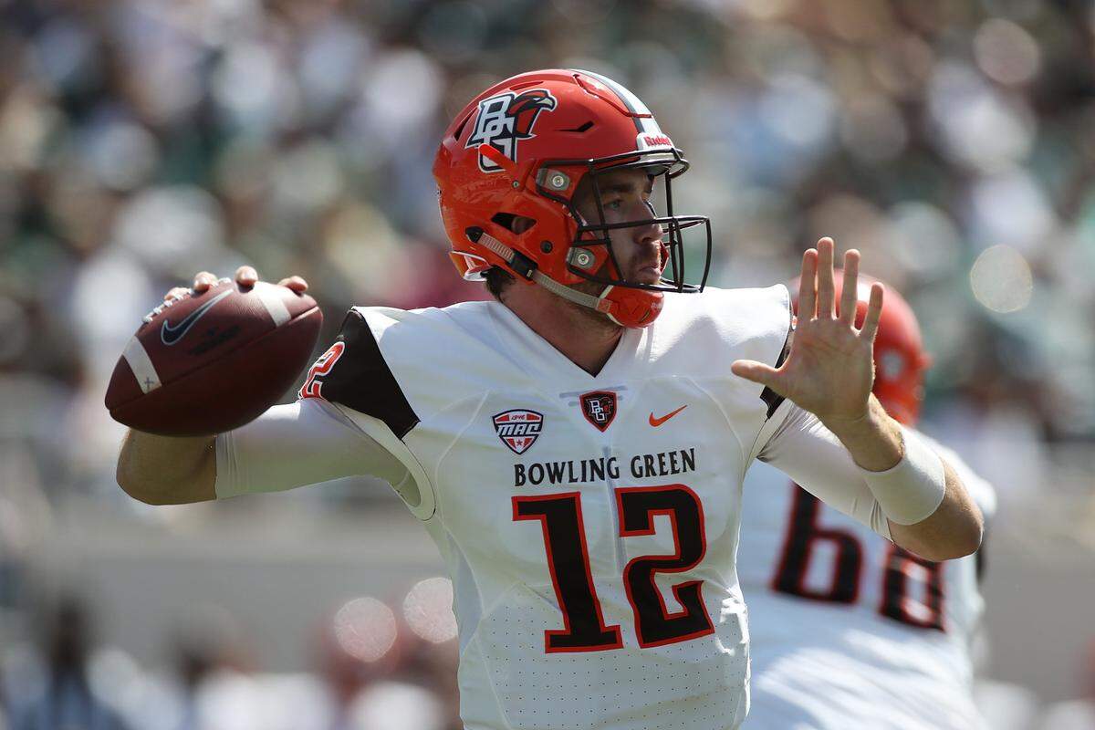 EAST LANSING, MI - SEPTEMBER 02:  James Morgan #12 of the Bowling Green Falcons throws a first half pass while playing the Michigan State Spartans at Spartan Stadium on September 2, 2017 in East Lansing, Michigan. (Photo by Gregory Shamus/Getty Images)