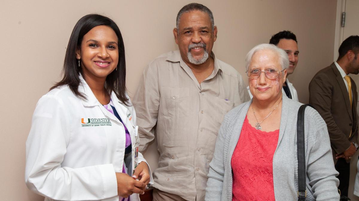 Isabel Rodriguez, her husband and Dalissa Tejera, APRN at the opening of Sylvester’s Phase 1 Clinical Trials Clinic for treating angiosarcoma.
