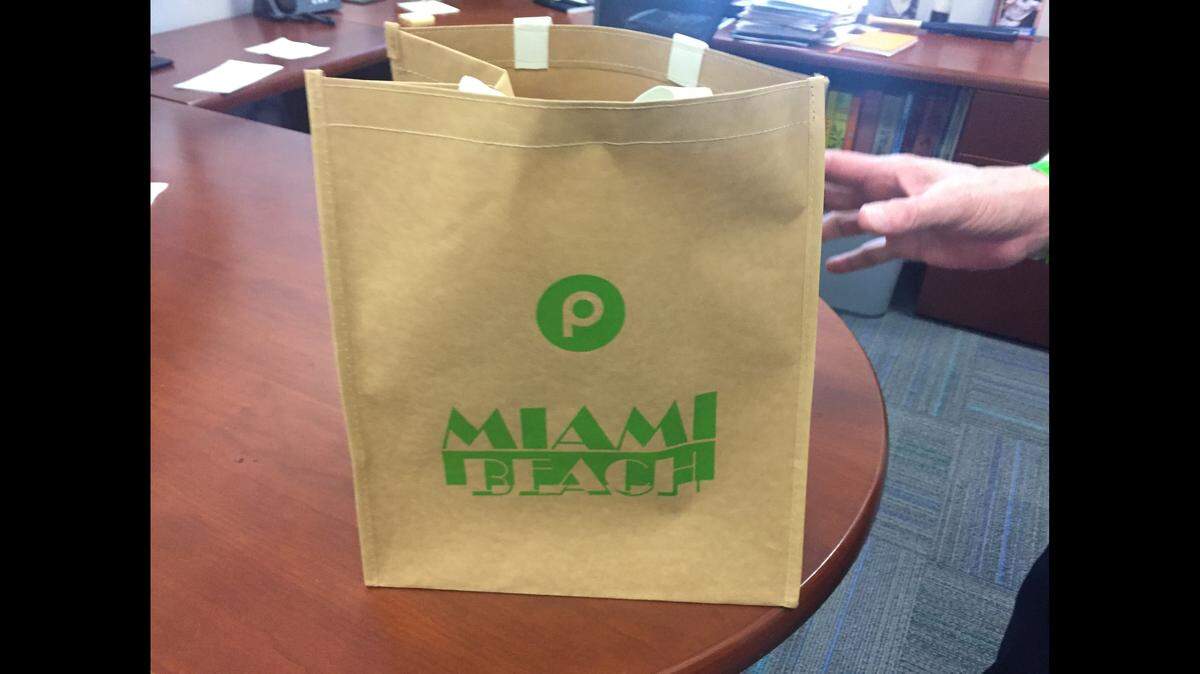 Publix has created this new reusable bag for its Miami Beach store. For a limited time the chain is handing one free one apiece to customers at the Beach locations to promote environmental friendliness and a move away from single-use plastic bags.